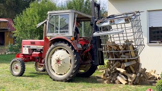 Brennnholz Gitterboxen mit Kistendrehgerät Hubmast und IHC 433 ausfahren und auskippen [upl. by Burger325]