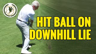 HOW TO HIT A GOLF BALL ON A DOWNHILL LIE [upl. by Naujal]