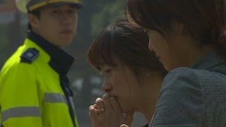 Parents try to heal after South Korea ferry disaster [upl. by Aihsrop]