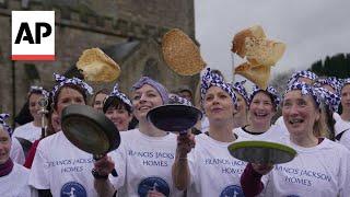 In this centuriesold English pancake race you just have to go flat out [upl. by Dublin]