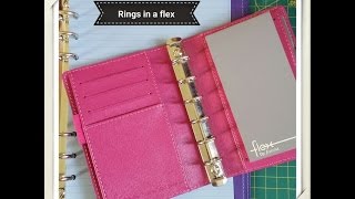 Putting rings into a Filofax flex [upl. by Akinyt]