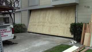 A wood one piece garage door [upl. by Glennon]