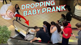 Dropping Baby Down The Escalator Prank [upl. by Seleta345]