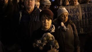 Protesters demand Hungarian presidents resignation over a pardon in a child sexual abuse case [upl. by Sawyere159]