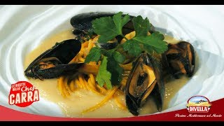 Spaghetti alla curcuma con le cozze su vellutata di fagioli dello Chef Carra  Divella [upl. by Yenterb]