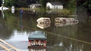 Eerie Coffins Seen Floating Through Flooded Louisiana Streets [upl. by Lazarus604]