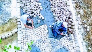 LAYING COBBLES TRADITIONAL ARC PATTERN NATURAL CUBE STONES CARPET TECHNIQUE GRITSTONE SETTS PRO [upl. by Nodla223]