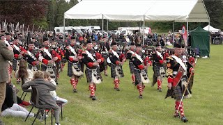 March of the Atholl Highlanders and Pipe Band during Atholl Gathering Highland Games in Scotland [upl. by Erdnaed]