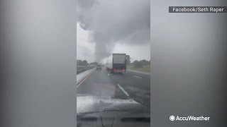 Tornado touches down in front of motorist in Florida  AccuWeather [upl. by Vola]