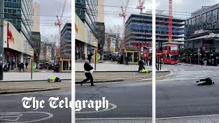 Pedestrians blown over by strong winds as Storm Eunice batters Britain [upl. by Elva101]