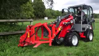 Weidemann minishovel met palen grasmaaier [upl. by Cassy]