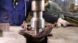 Real work with the hydraulic press changing car wheel bearing [upl. by Atnauqahs357]