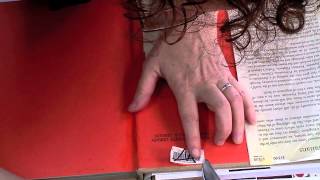 Remove a Library Barcode Sticker with a Book Repair Knife [upl. by Neffets143]