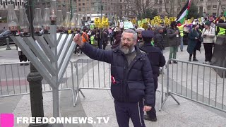 Man Lights Menorah as Hundreds ProPalestine Protesters Gathered  NYC [upl. by Myrilla176]