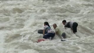 Firefighters Rescue Three from Flooded River in Southwest China [upl. by Camden]