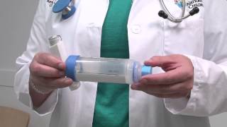 Asthma howto How to use an inhaler with a spacer and mouthpiece [upl. by Aedni]