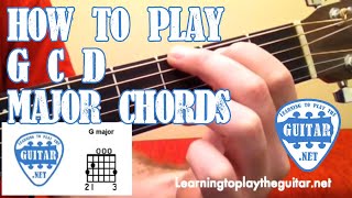 How To Play G C D Major Chords  Learning To Play The Guitar [upl. by Raimund]