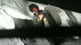 Chilling photos of Boston bombing suspect when captured [upl. by Helman498]