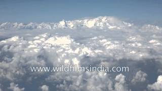 Over the Himalaya Everest and Makalu seen over monsoon cloud cover [upl. by Arev]