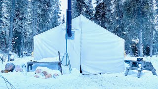 Winter camping overnight in a canvas tent with a wood stove [upl. by Walsh]