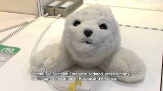 Cute Baby Seal Robot  PARO Theraputic Robot DigInfo [upl. by Ahsinak658]