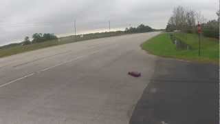 102mph Traxxas XO1 run followed by 102mph introduction to a road reflector [upl. by Thia]