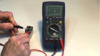 How to measure DC voltage with a DMM  Digital Multimeter [upl. by Madeleine]