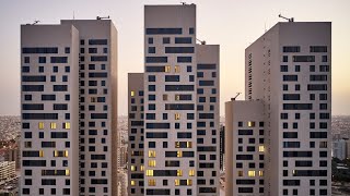 AGi Architects designs Tamdeen Square as a quotvertical neighbourhoodquot overlooking the Persian Gulf [upl. by Let943]