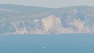 Landslip at St Oswalds Bay on the Jurassic Coast between Durdle Door and Lulworth Cove Dorset [upl. by Faludi240]