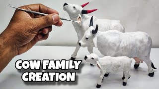 Sculpting clay Making Cow Family with clay  Clay Animals Art [upl. by Annoyed445]