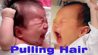 Babies pulling hair Newborn babies cant control his own hand [upl. by Timothee336]