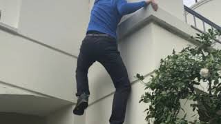 Alex Honnold climbs a building on the AFI campus [upl. by Ilram]