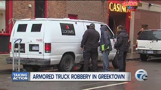 Man dressed as security guard steals money from armored vehicle outside Greektown Casino in Detroit [upl. by Rockie493]