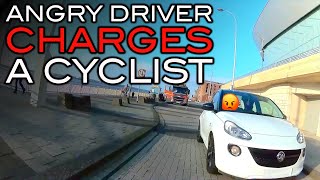 An Angry Motorist Charges A Cyclist [upl. by Lourie]