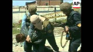 Chechnya  Russian Forces Disarm Grozny Rebels [upl. by Ahtivak]