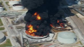 Fire at oil refinery sends up tower of black smoke [upl. by Silloc133]