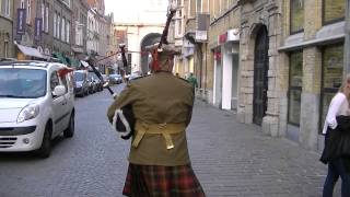 Marching with the Bagpipes toward the Menin Gate Ypres [upl. by Ahsaret]