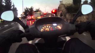 Pizza deliveries on a scooter in rainhail משלוחי פיצה כשיורד ברד [upl. by Nawyt]