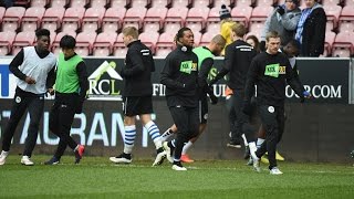 KICK IT OUT  Wigan Athletic players warm up for dedicated Kick It Out game [upl. by Whitver]