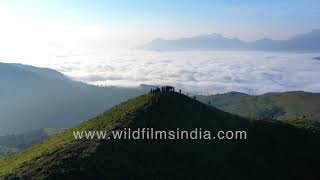 Kyatanamakki Hill Station  Offroading trucks on hilltop mist covering hills in aerials [upl. by Nhguaved344]