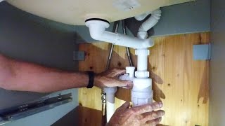 How to stop drain noises and smells from your sink [upl. by Aneerak]