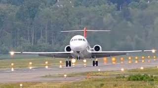 Helvetic Fokker F100 landing amp overflight at airport BernBelp HD [upl. by Attelrac]