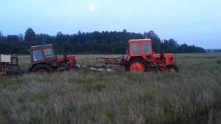 Belarus Mtz 80UK with big sprayer stuck in mud Mtz 82UK trying to help [upl. by Aihtenyc113]