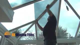 Installing window film on a shaped glass conservatory roof [upl. by Oinotla897]