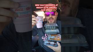 Wendys NEW Saucey Nuggets are Here Taste Test food [upl. by Lekcim]