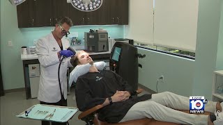 Experts using new device to help battle hair loss [upl. by Ilhsa]