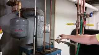 How To Remove Air From Your Heating System [upl. by Anitnerolf550]