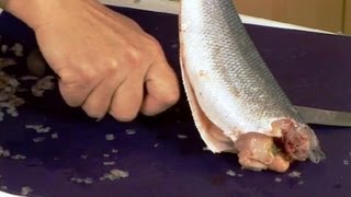 How to prepare a whole fish  GoodFoodcom  BBC Food [upl. by Nwadrebma]