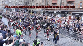 The Atholl Highlanders and The Lonach Highlanders parade down The Royal Mile [upl. by Brannon]